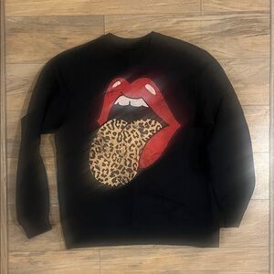 Black Sweater with Red and Leopard Print Design